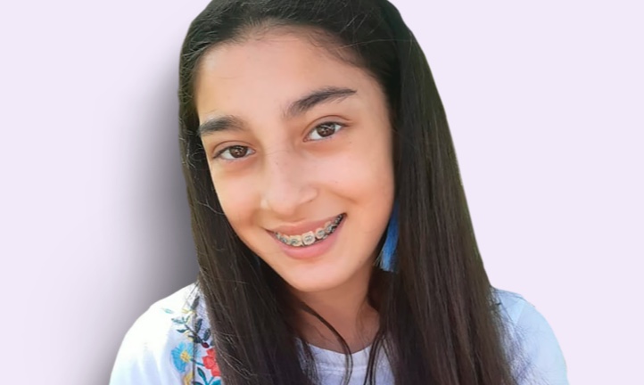College student Senara, 17, smiles for the camera